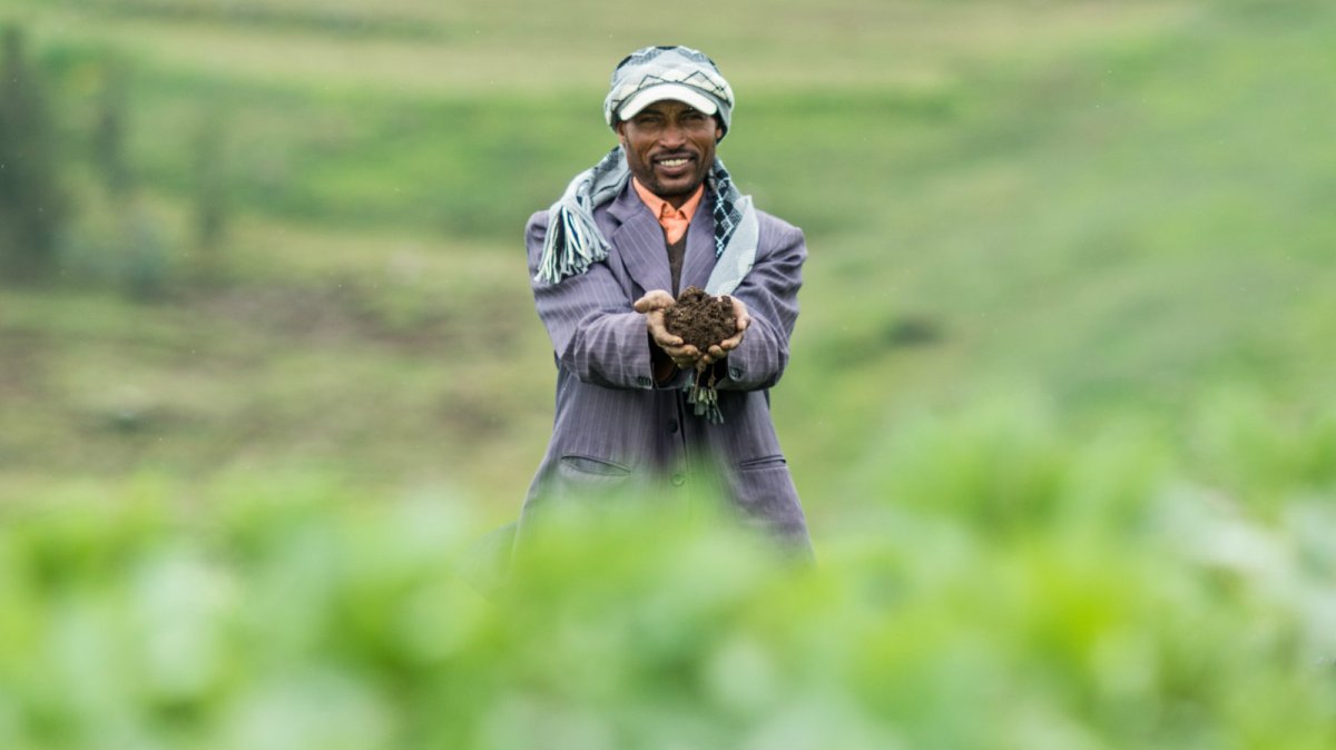 Ethiopian farmer and soil